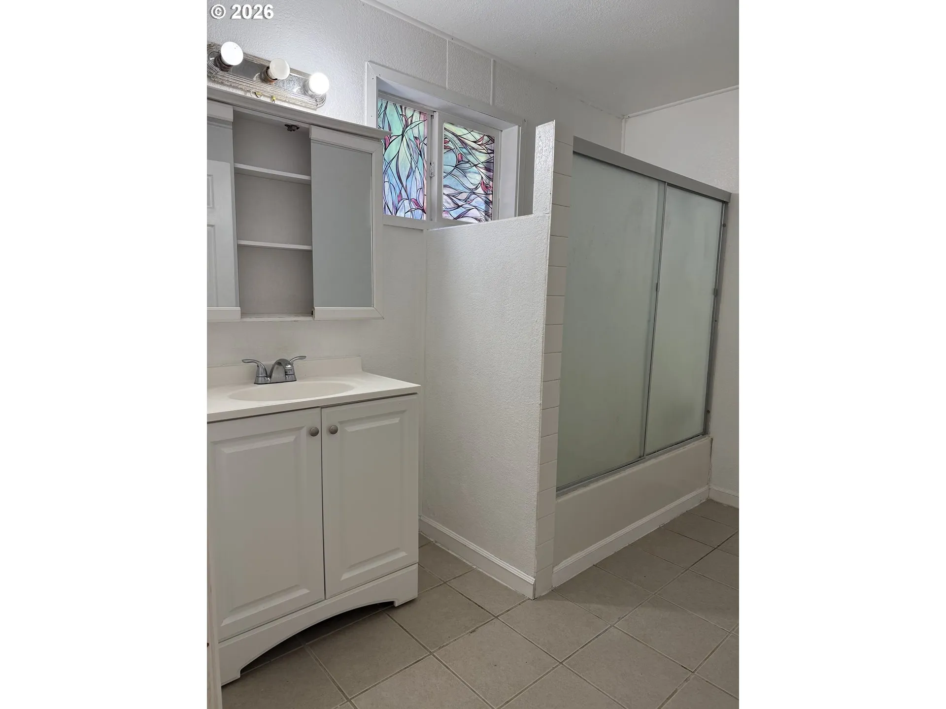 Primary Bedroom-Attached Bathroom