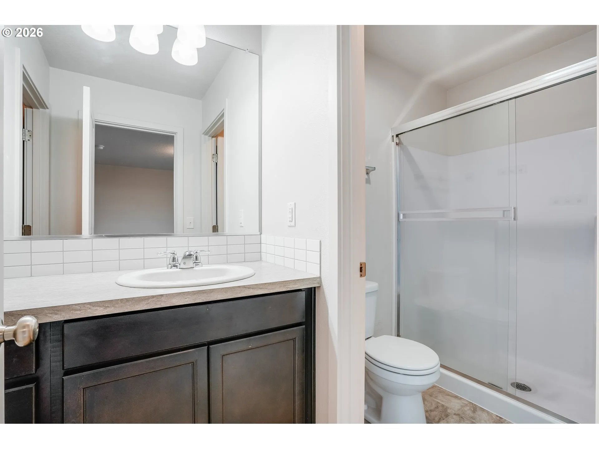 Primary Bedroom-Attached Bathroom