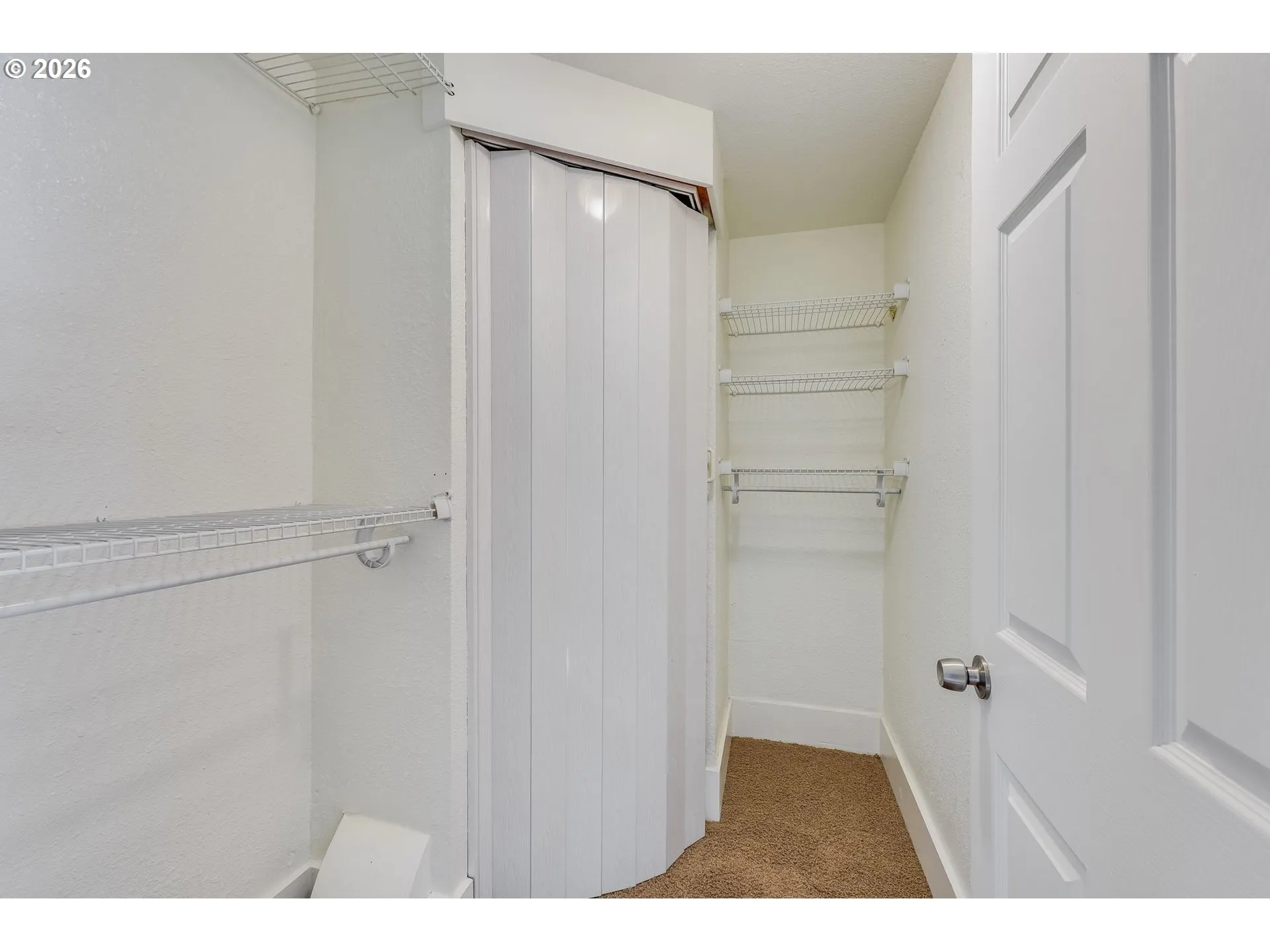 Primary Bedroom-Walk-In Closet