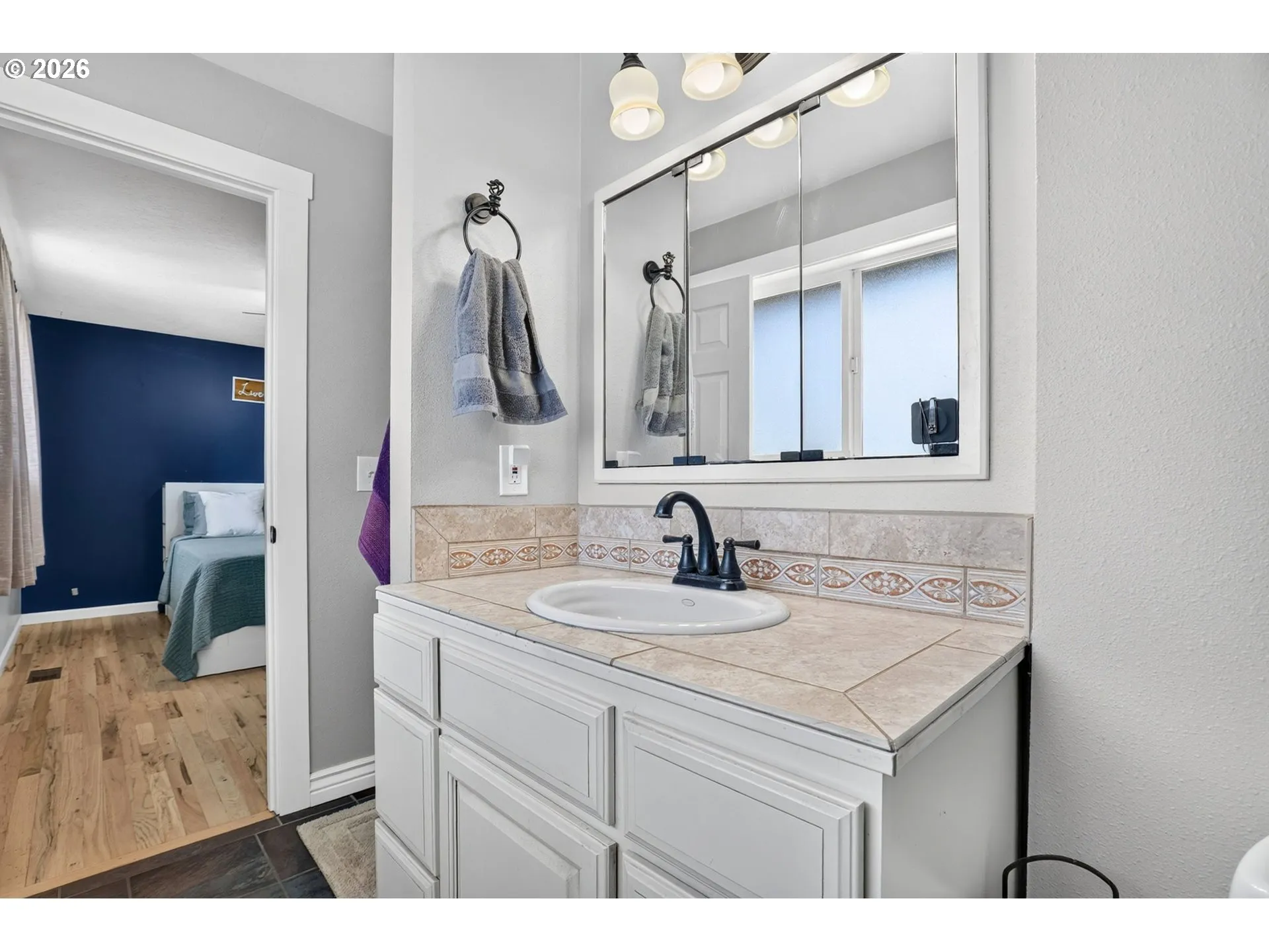 Primary Bedroom-Attached Bathroom