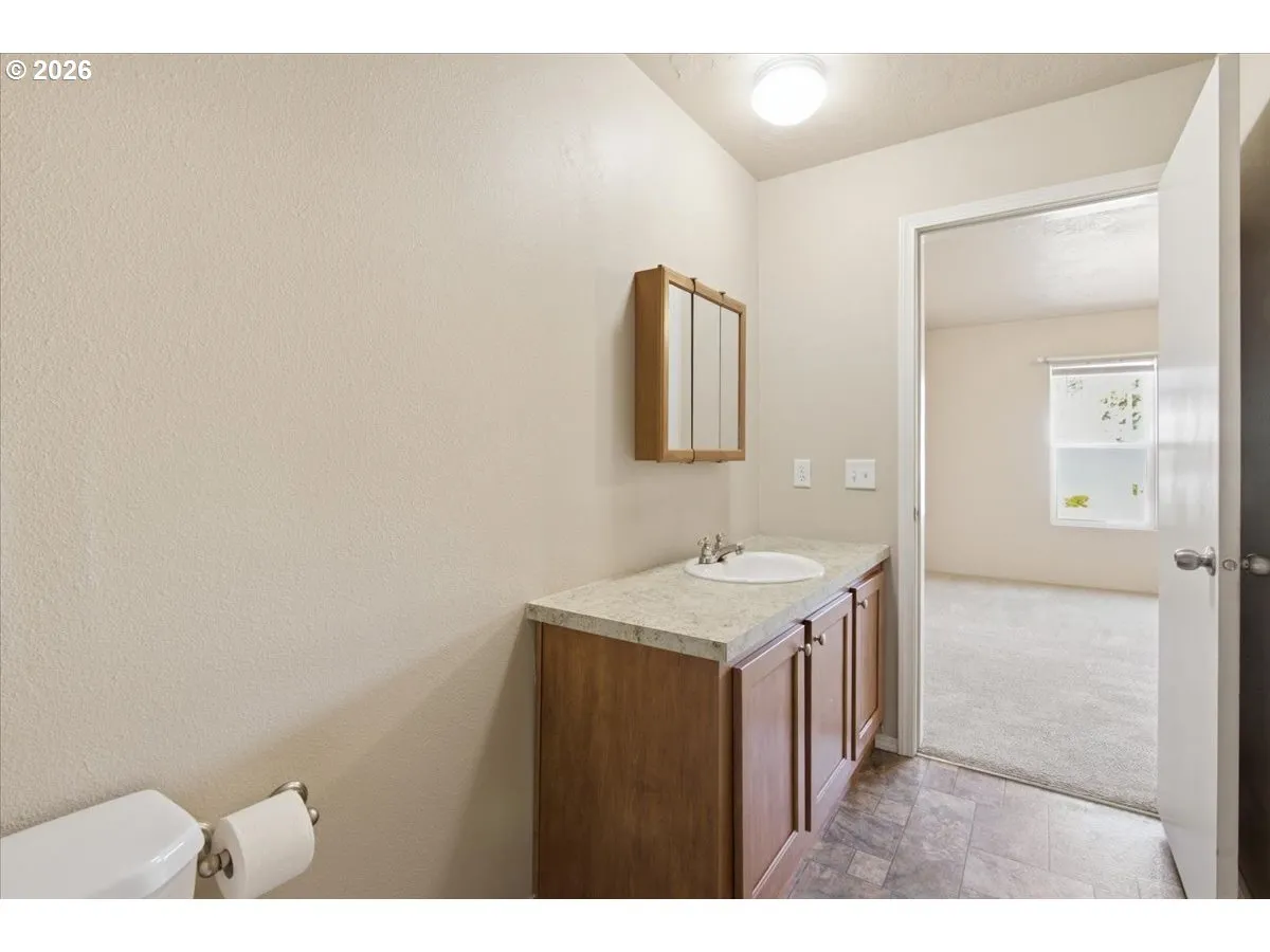 Primary Bedroom-Attached Bathroom