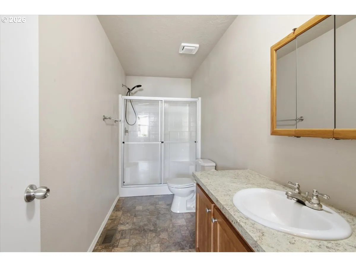 Primary Bedroom-Attached Bathroom