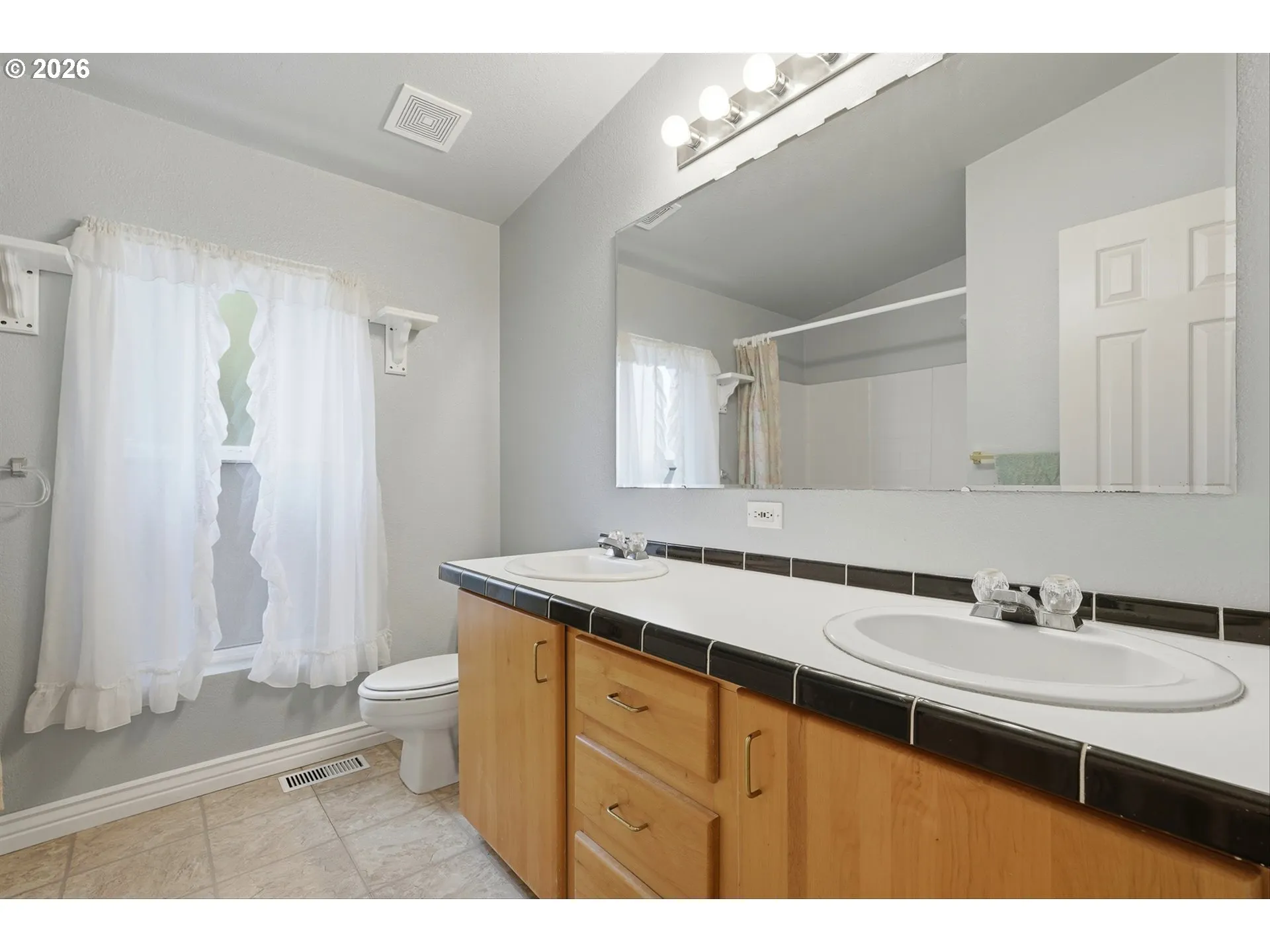 Primary Bedroom-Attached Bathroom