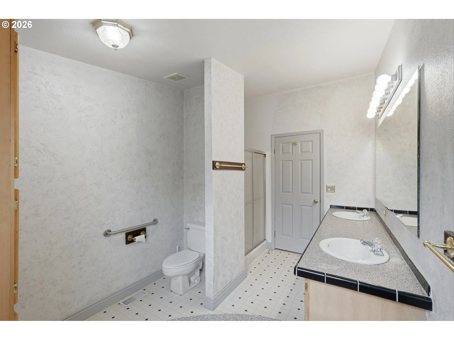 Primary Bedroom-Attached Bathroom