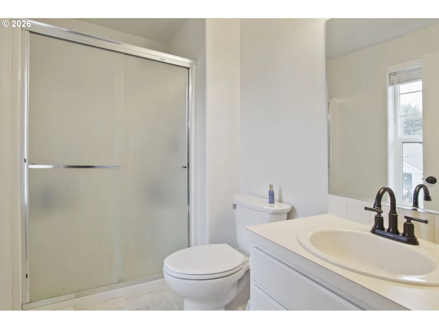 Primary Bedroom-Attached Bathroom
