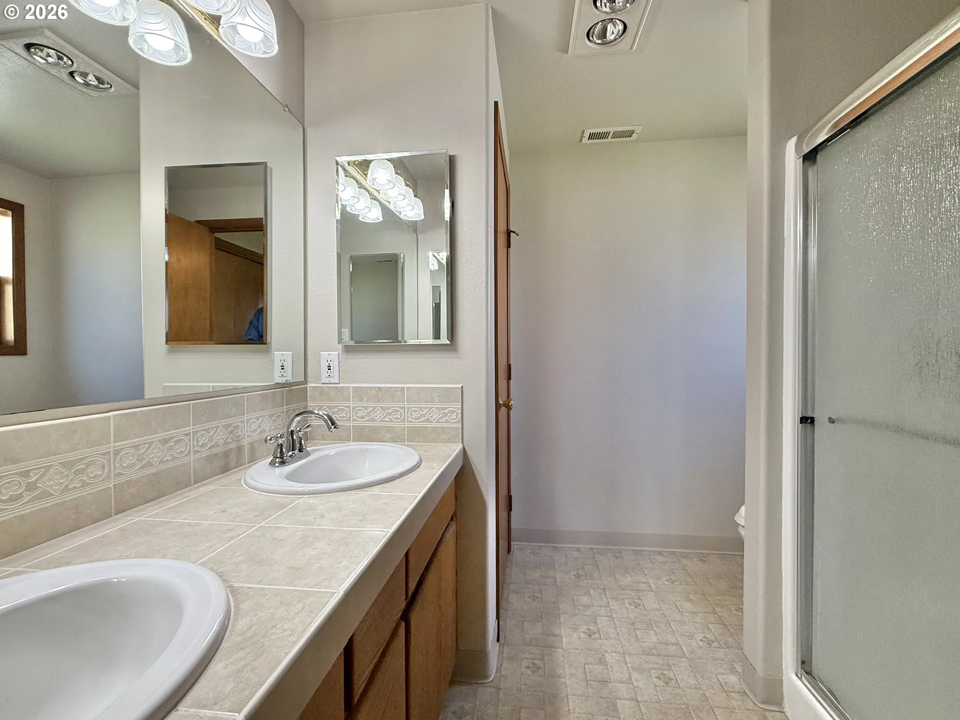 Primary Bedroom-Attached Bathroom