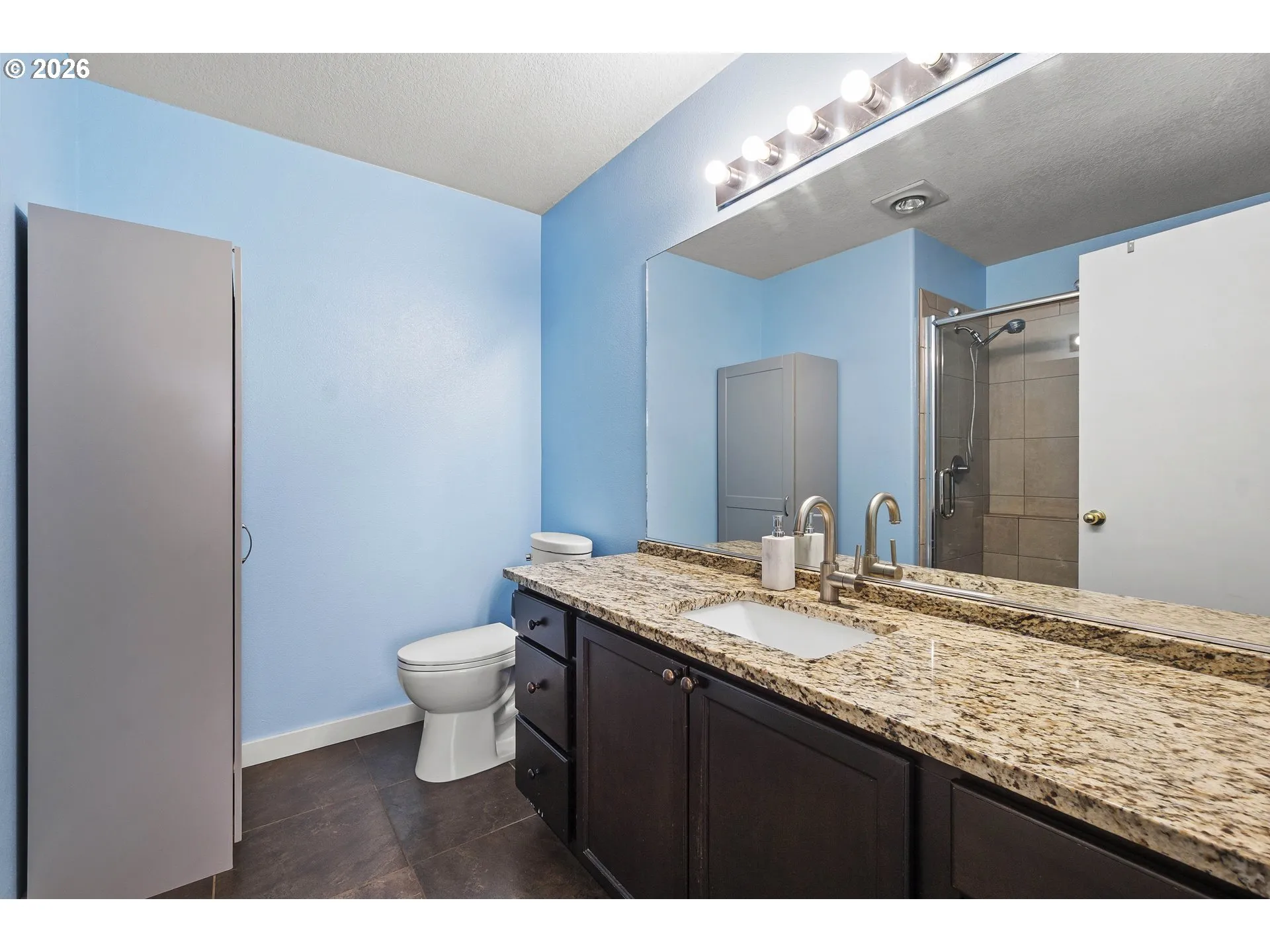 Primary Bedroom-Attached Bathroom