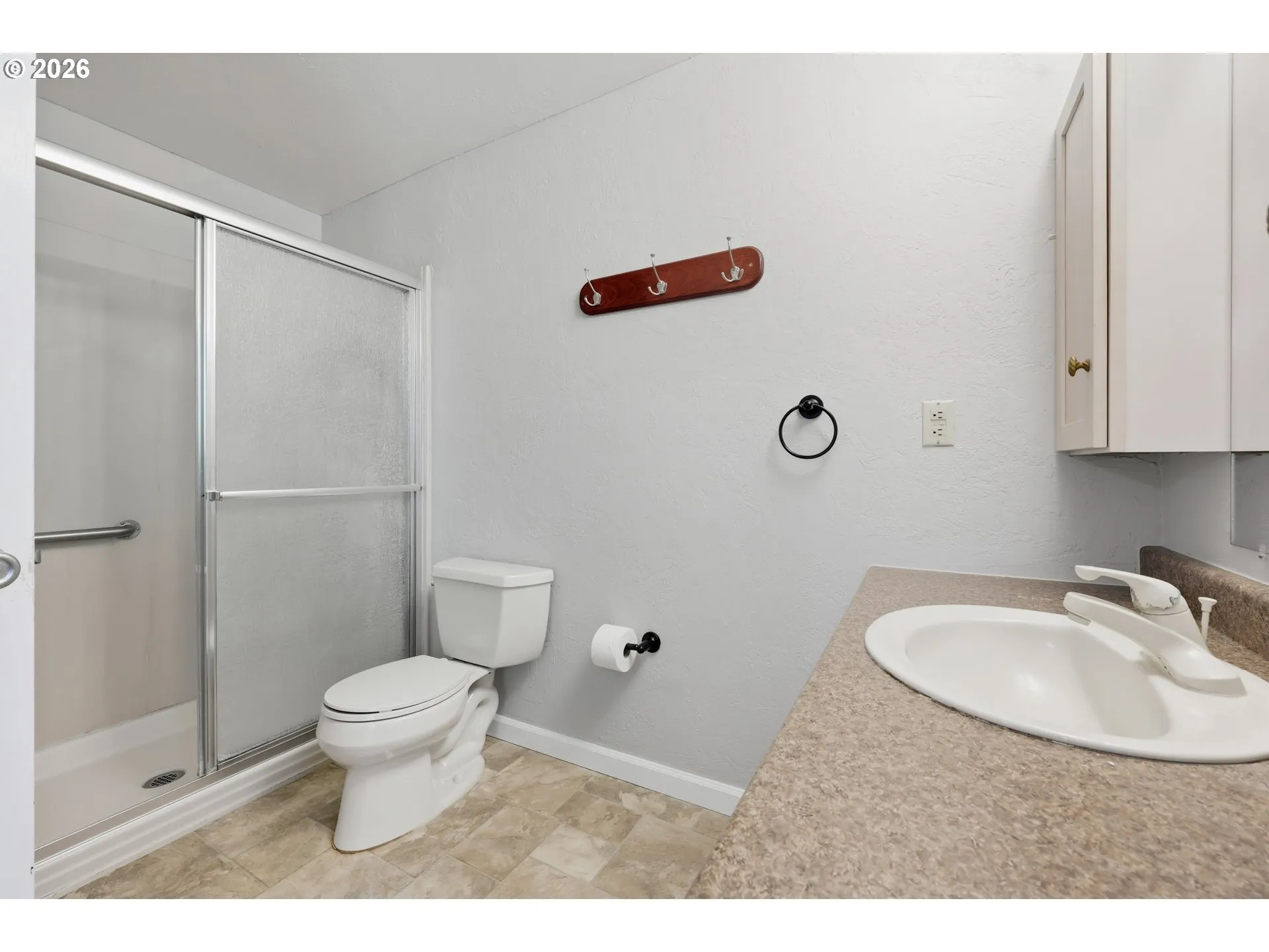 Primary Bedroom-Attached Bathroom