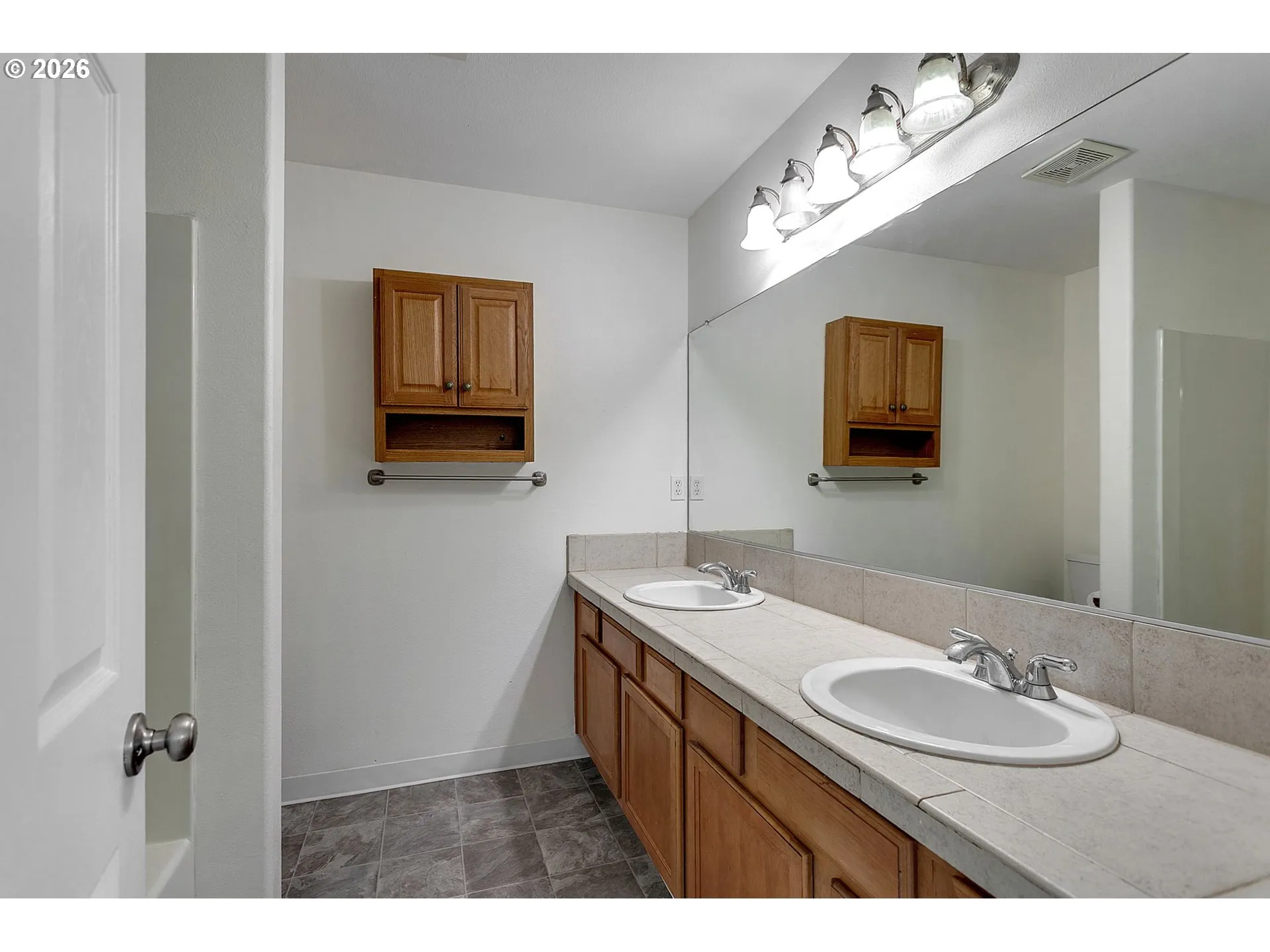 Primary Bedroom-Attached Bathroom