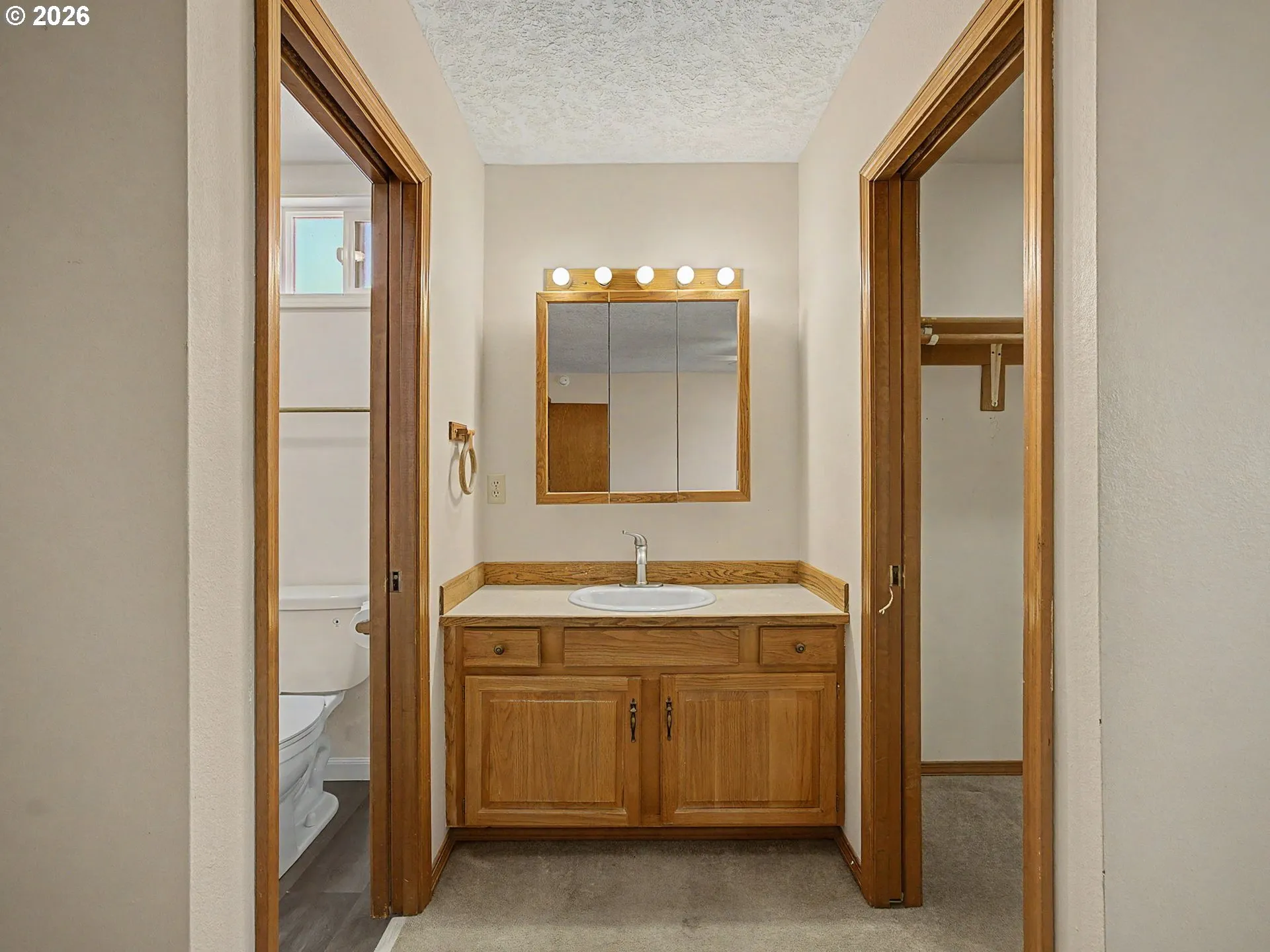 Primary Bedroom-Attached Bathroom