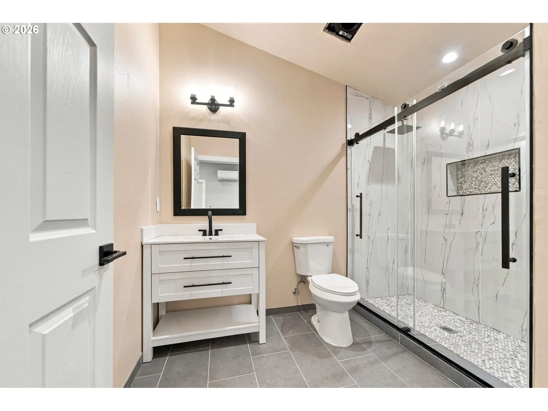 Primary Bedroom-Attached Bathroom