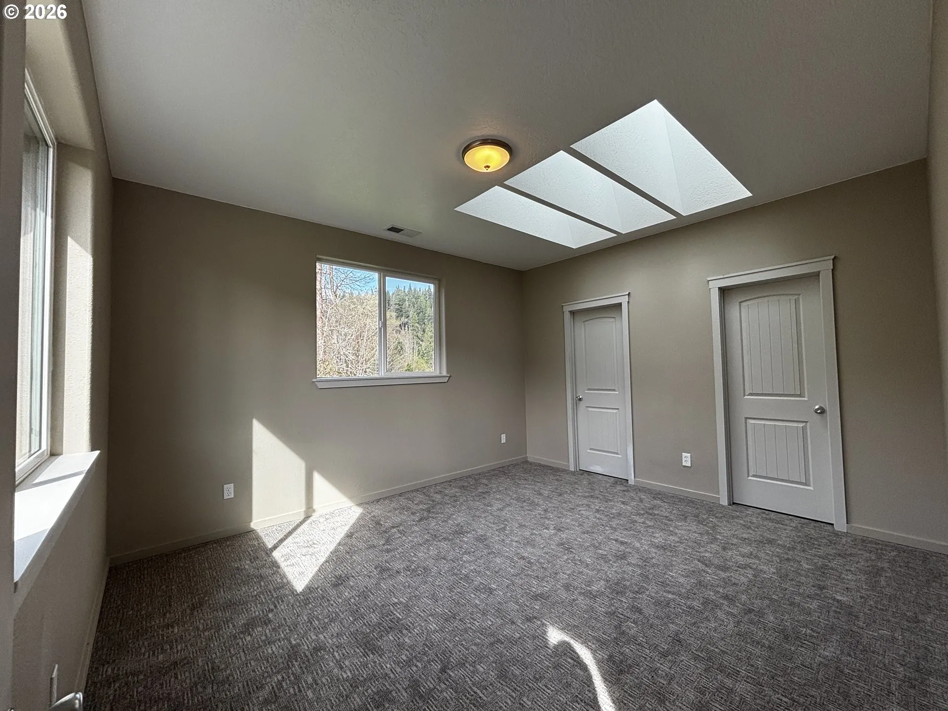 Owner's Suite Bedroom-Vaulted Ceilings