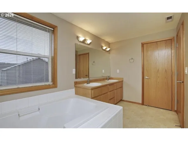 Primary Bedroom-Attached Bathroom
