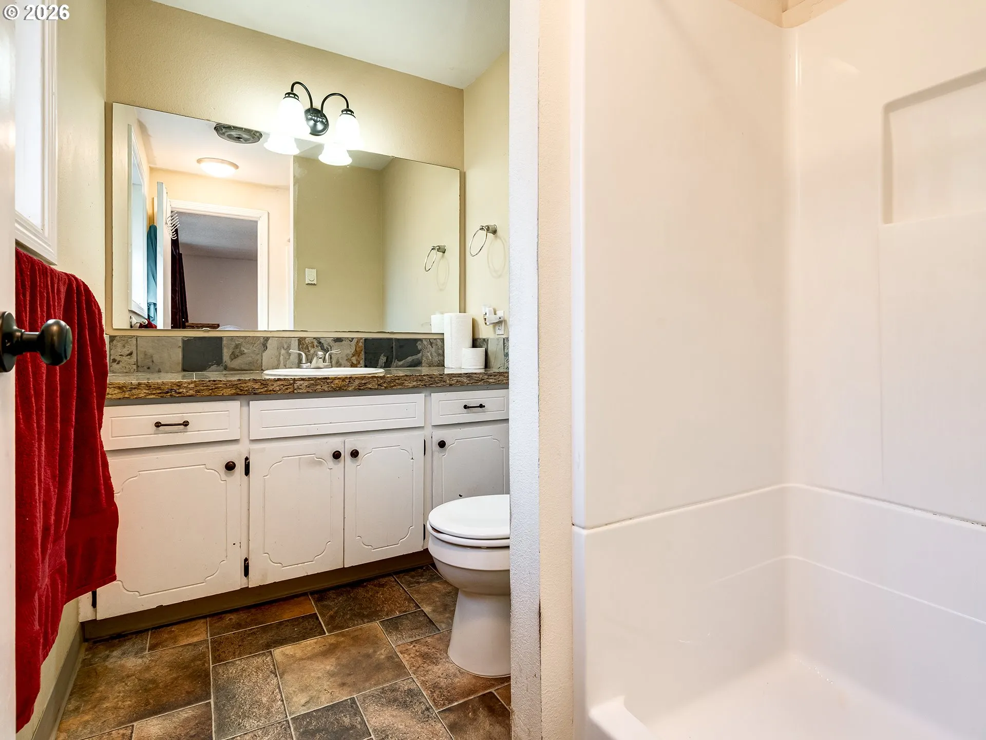 Primary Bedroom-Attached Bathroom