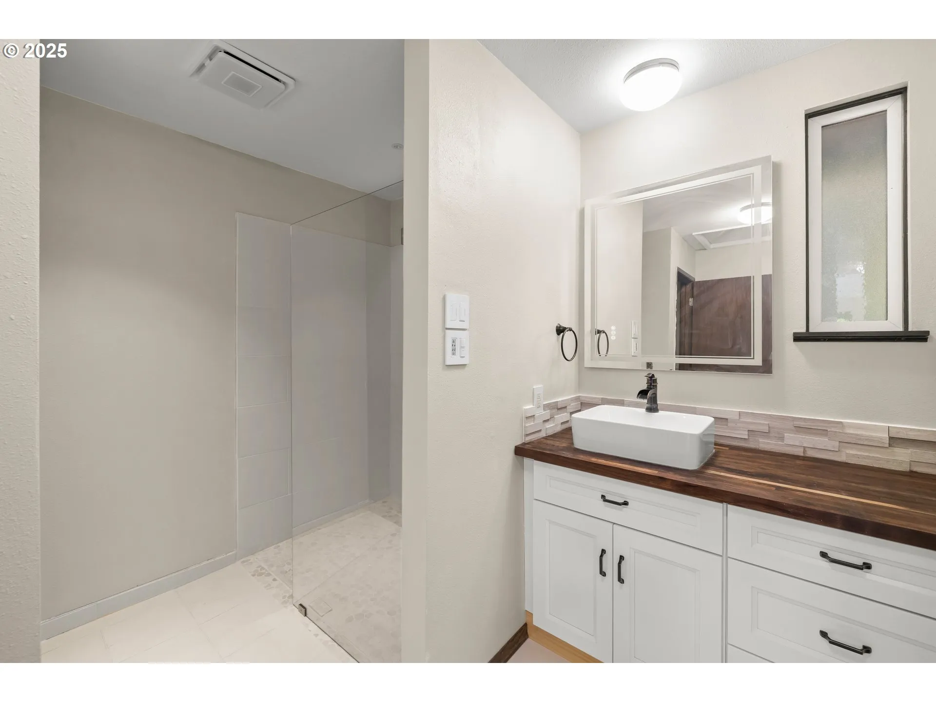Primary Bedroom-Attached Bathroom