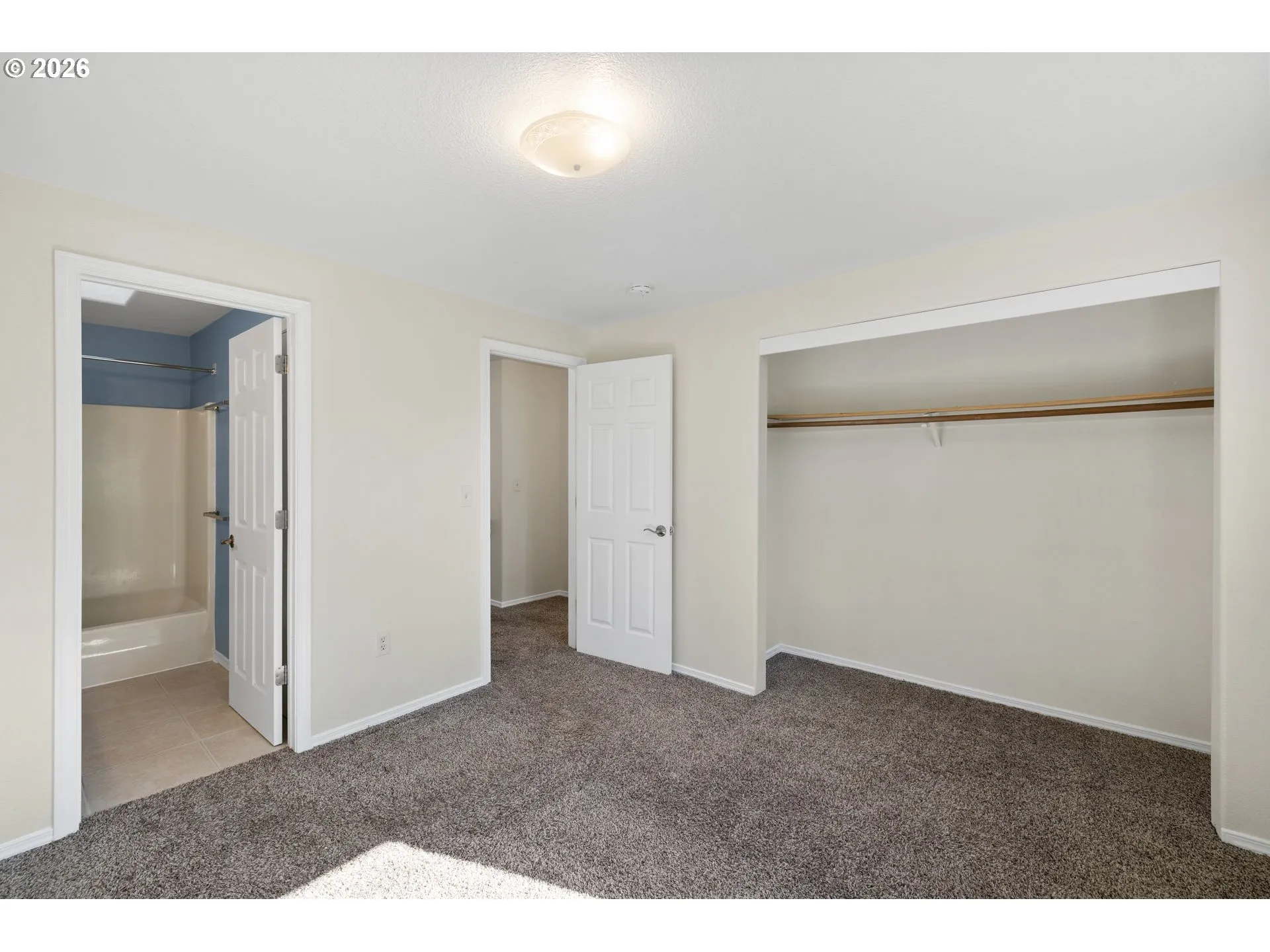 Primary Bedroom-Attached Bathroom