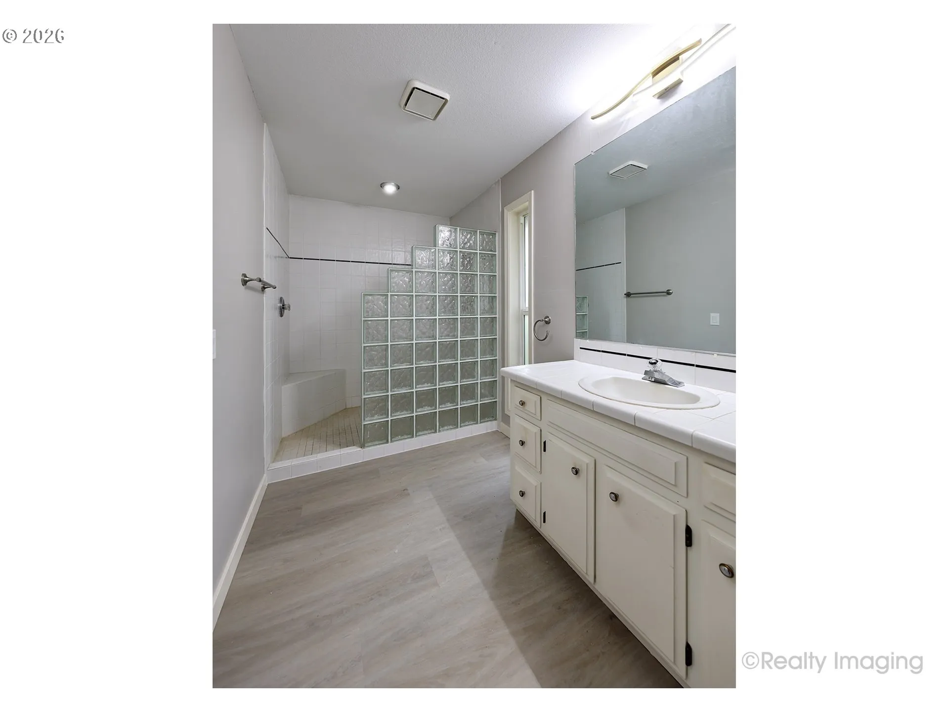 Primary Bedroom-Attached Bathroom