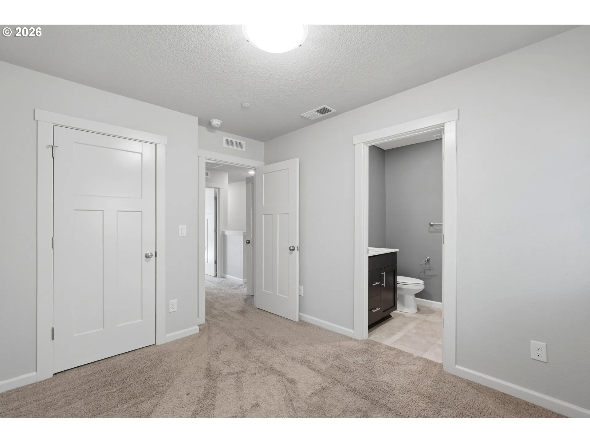 Primary Bedroom-Attached Bathroom