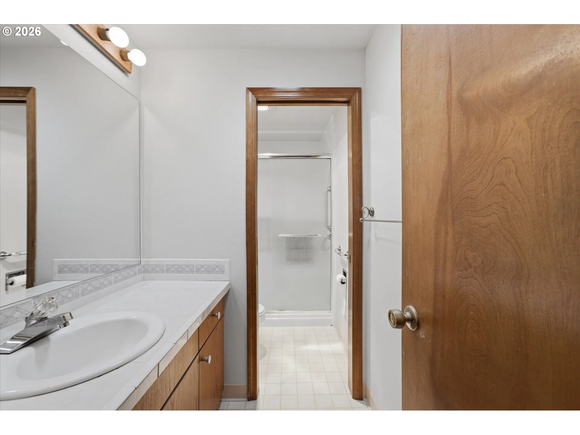 Primary Bedroom-Attached Bathroom