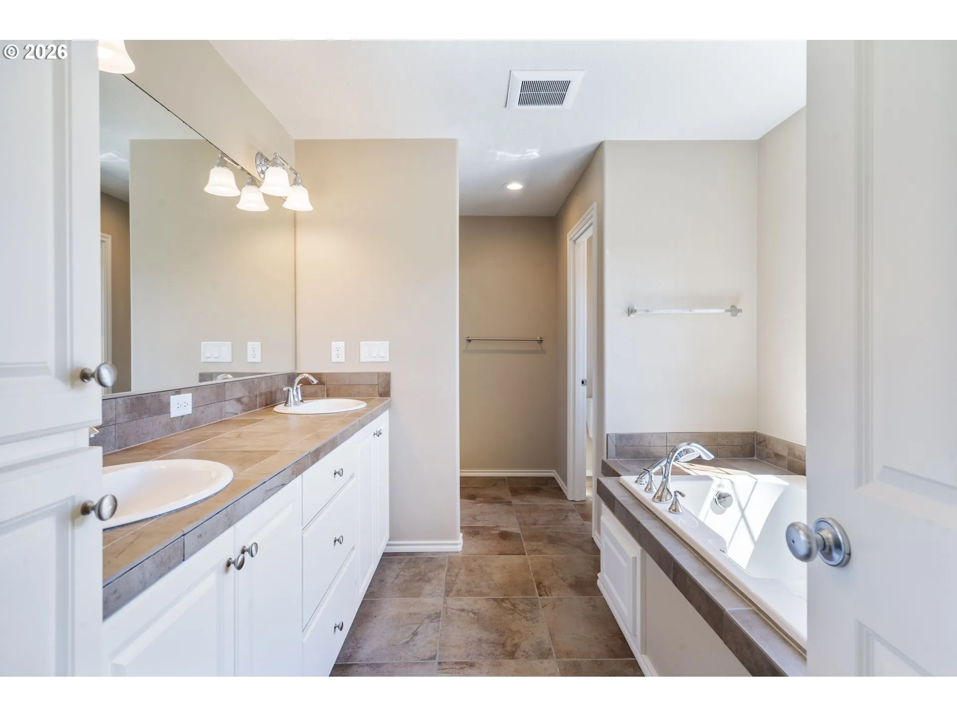 Primary Bedroom-Attached Bathroom