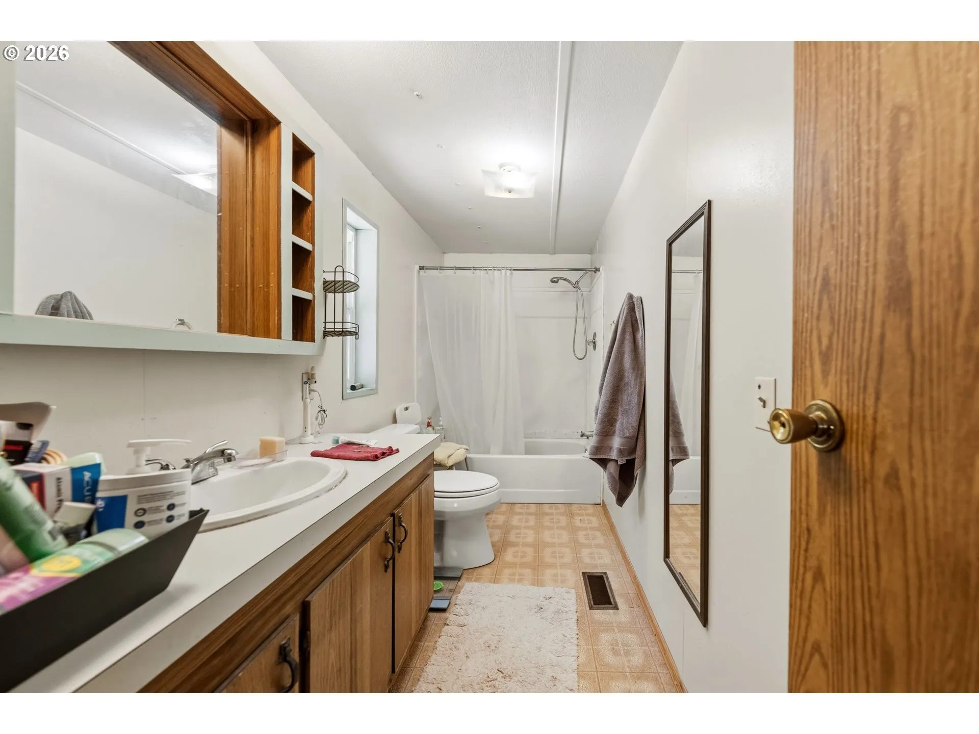 Primary Bedroom-Attached Bathroom