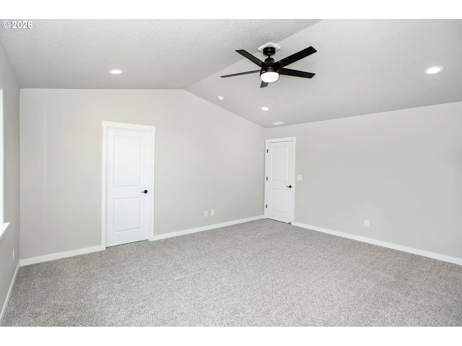 Owner's Suite Bedroom-Vaulted Ceilings