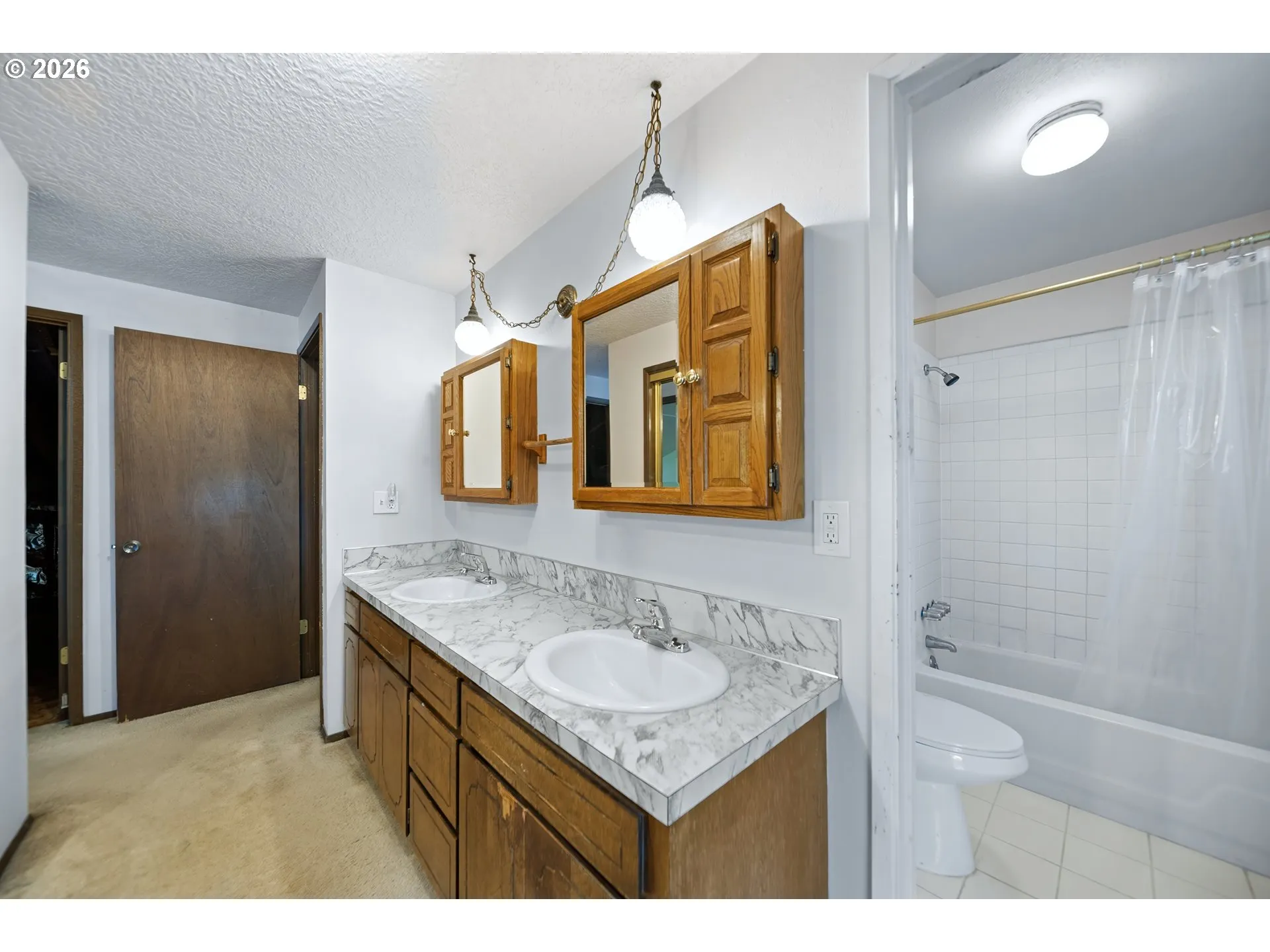 Primary Bedroom-Attached Bathroom