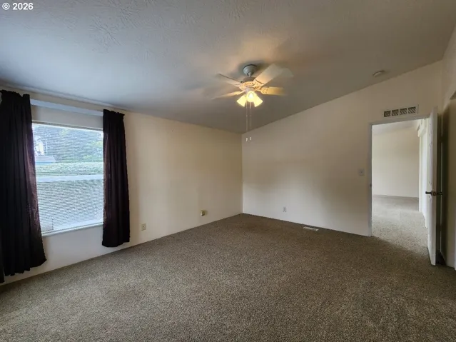 Bedroom, Owner's Suite-Vaulted Ceilings
