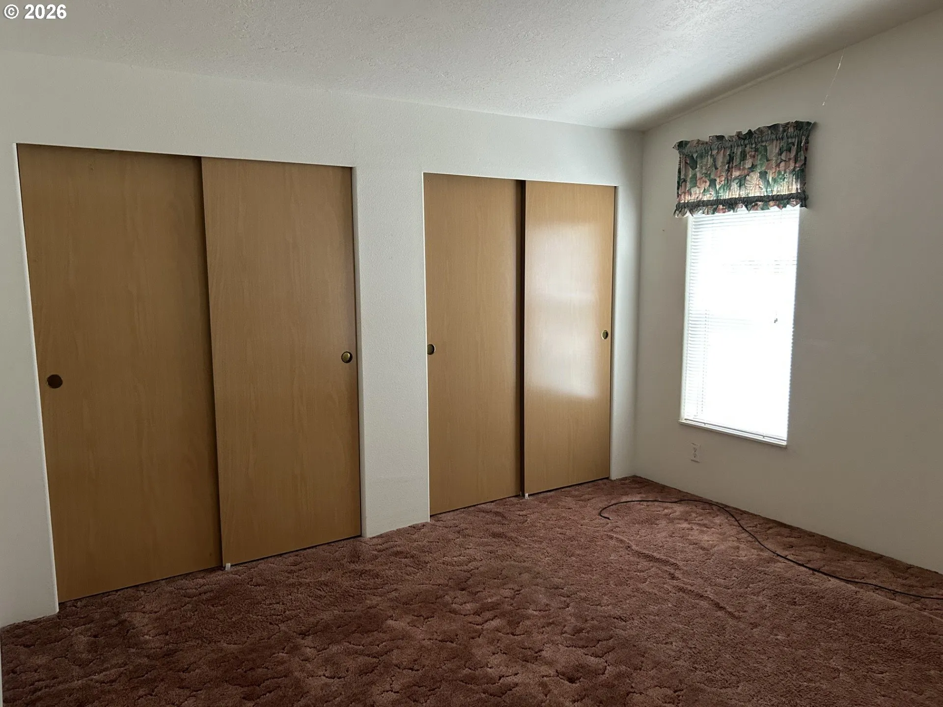 Owner's Suite Bedroom-Vaulted Ceilings