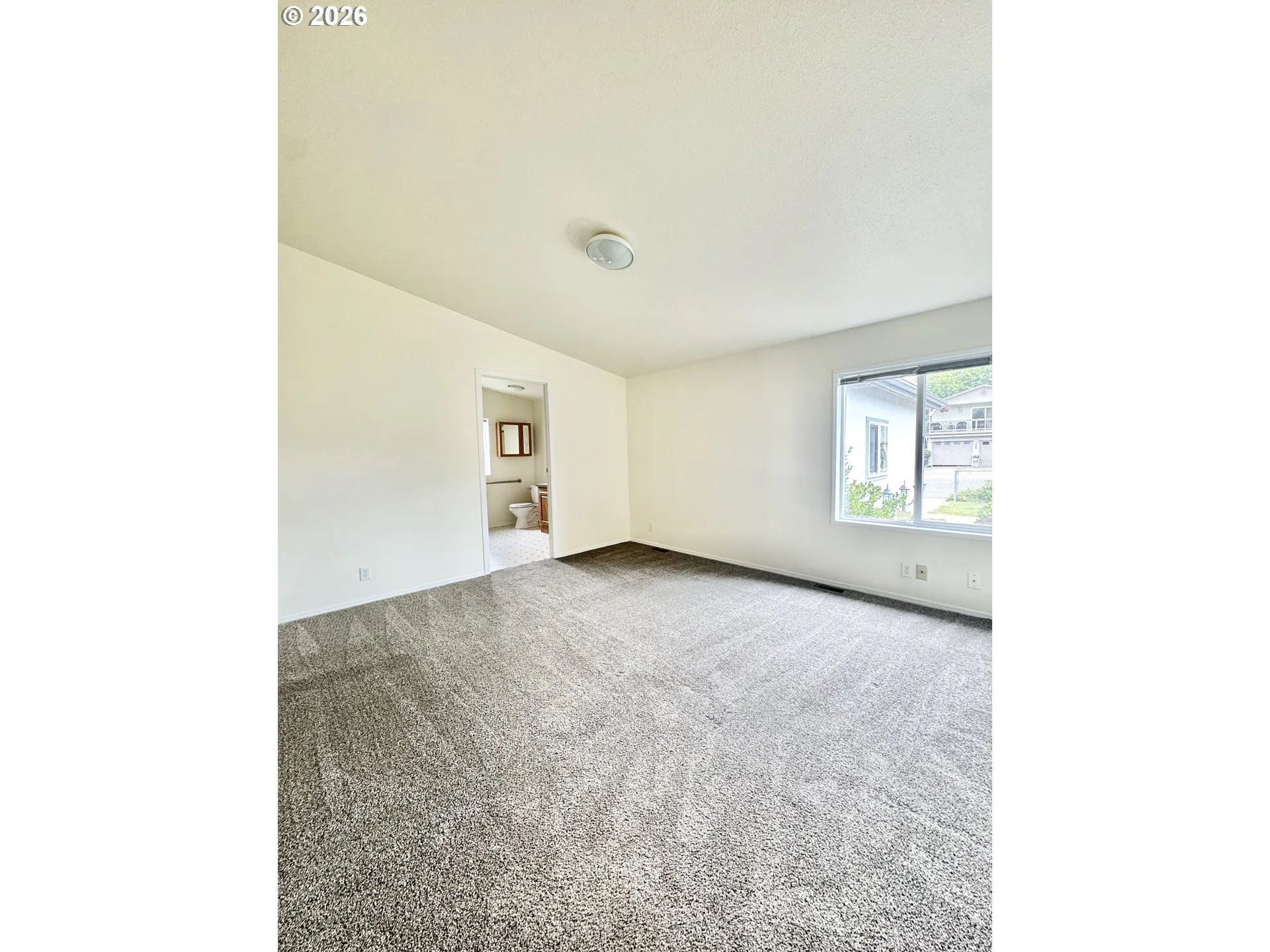 Bedroom, Owner's Suite-Vaulted Ceilings