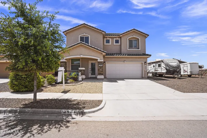 .19 acre, corner lot, fully landscaped with an RV hookup, 4 bedrooms, 3 bath & so much more!