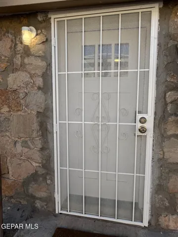 Door to apartment is located in the easement on the North side of the garage.