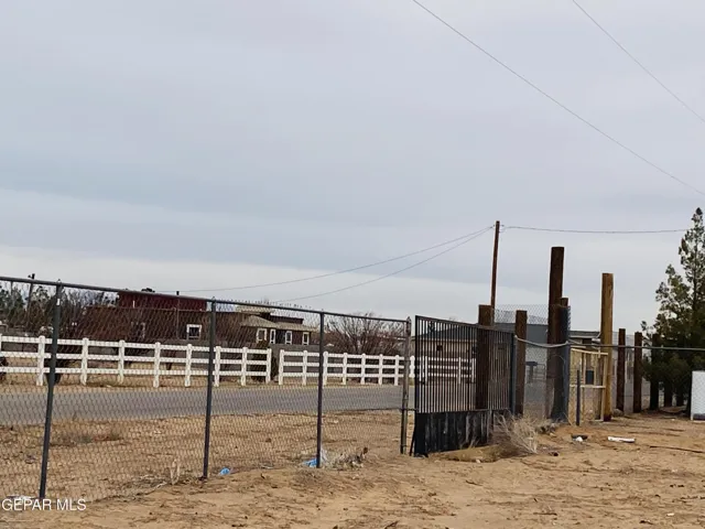 One acre. Fenced, two septic tanks, services ready to go.