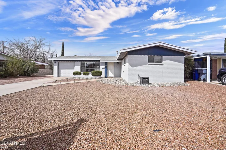 You'll love this remodeled home with a pool, NO carpet, open living spaces, & more!