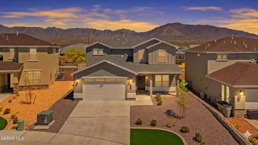 Contemporary two-story home with 3 beds, 2.5 baths, 2,487 sqft, inviting curb appeal, and like-new construction built in 2024.