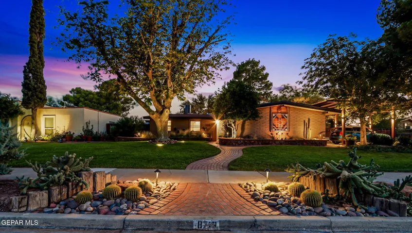 Gorgeous landscape lighting automatically comes on at dusk
