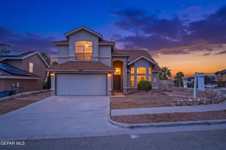 Two-story home on a corner lot featuring 4 bedrooms, 2.5 baths, formal dining and living spaces, refrigerated air, and an oversized corner lot.
