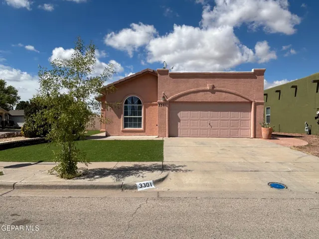 single story home with two car garage