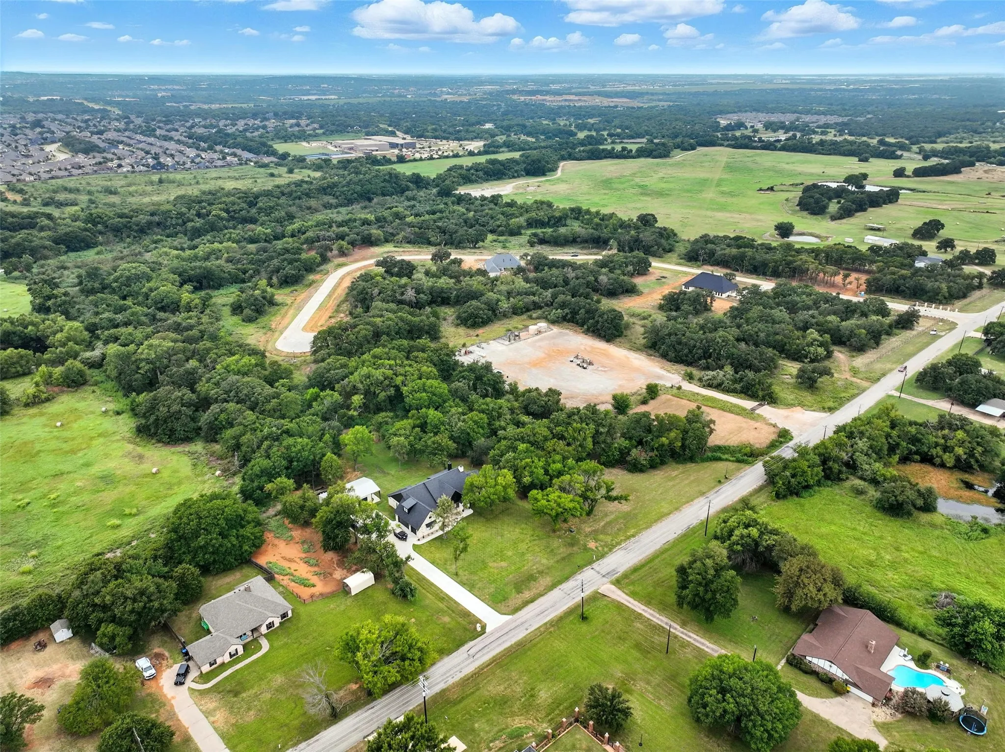 Aerial view of property and surrounding area