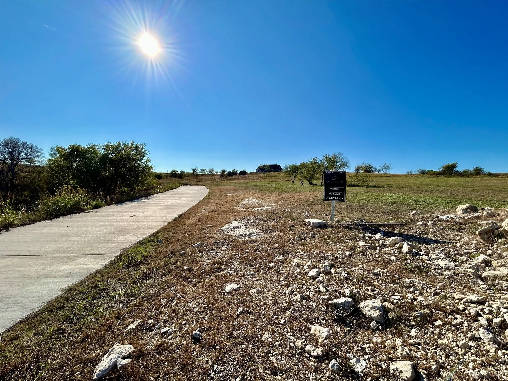 Concrete driveway to Lot 31