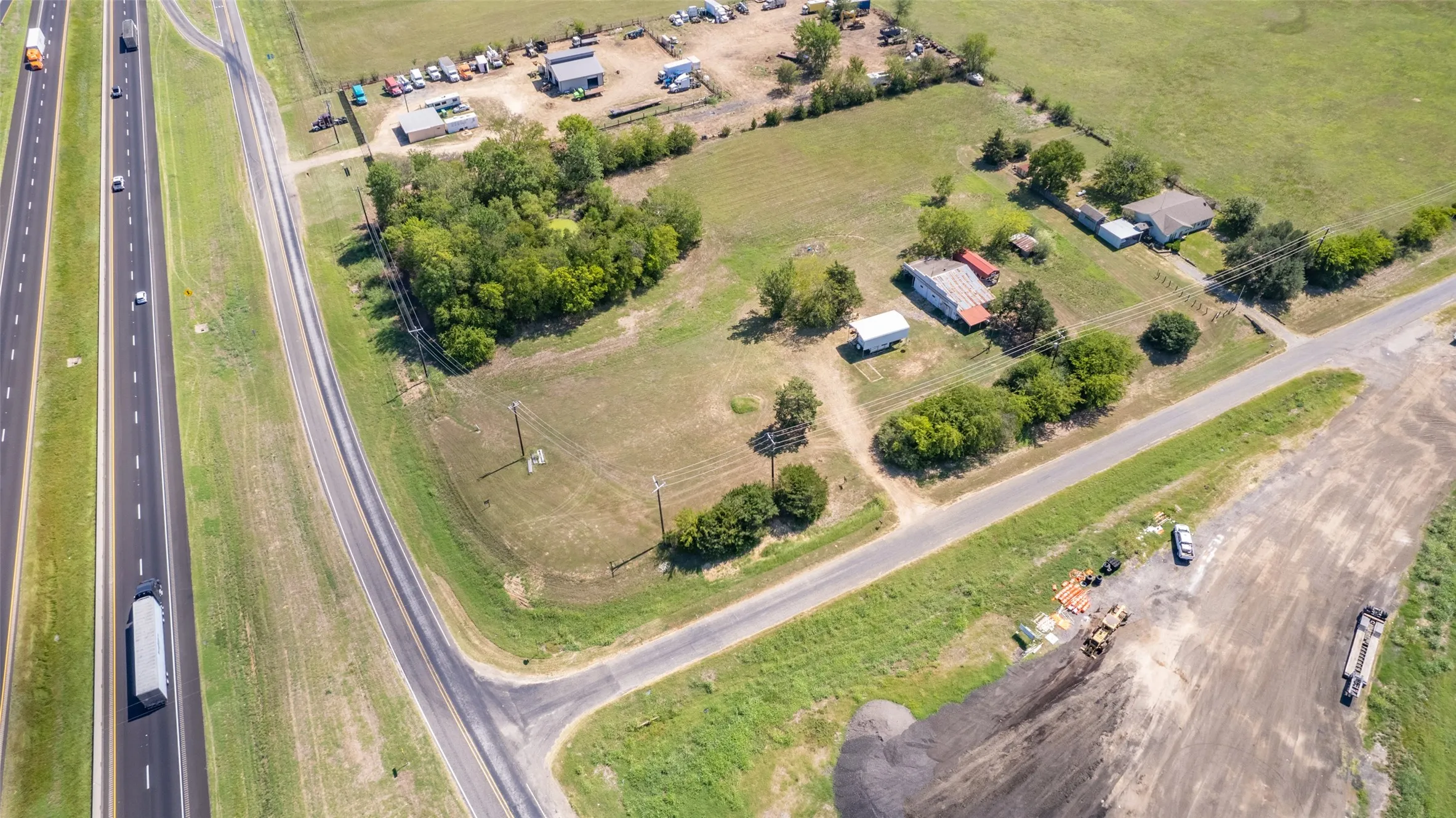House on SW corner not included
