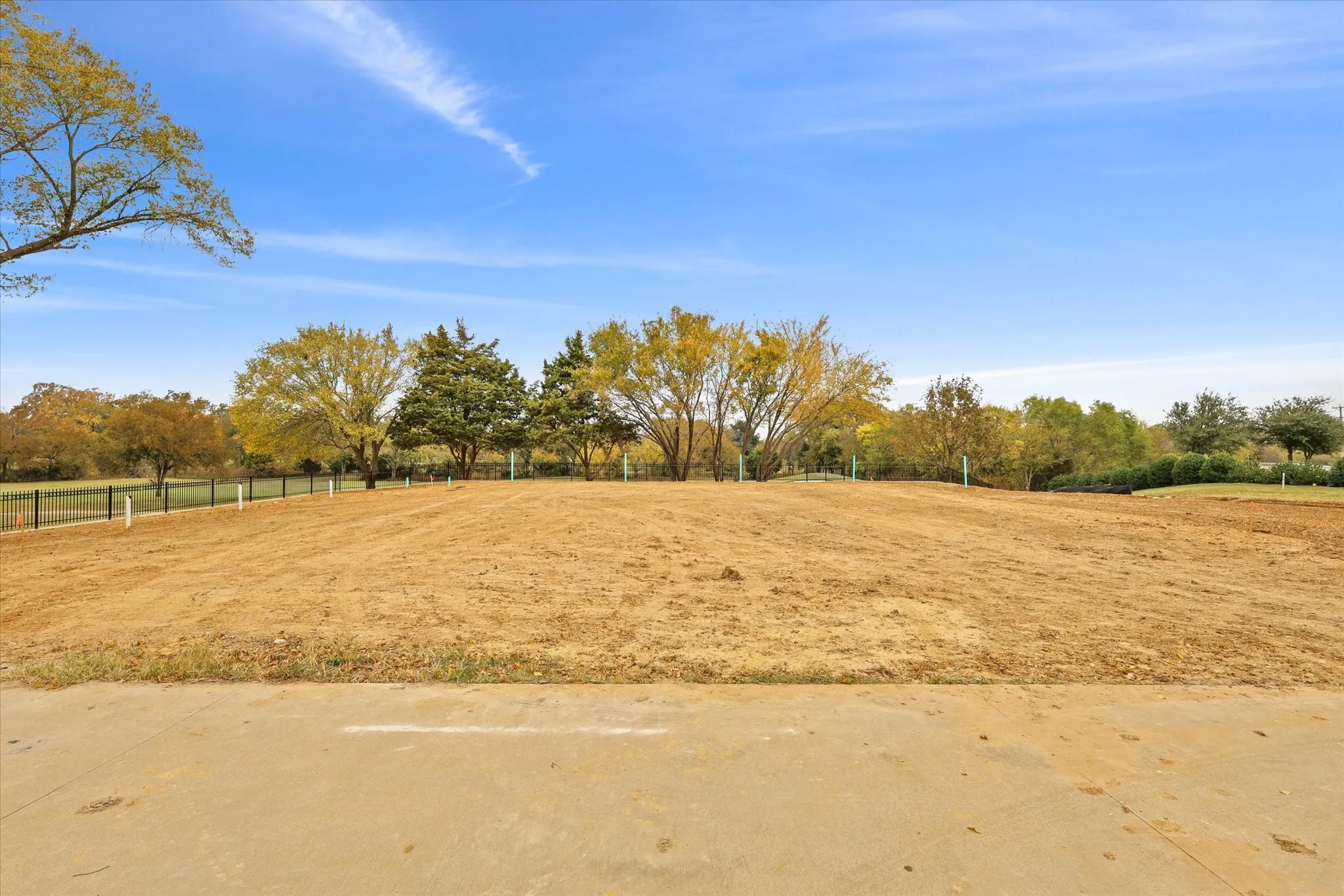View of yard with a rural view