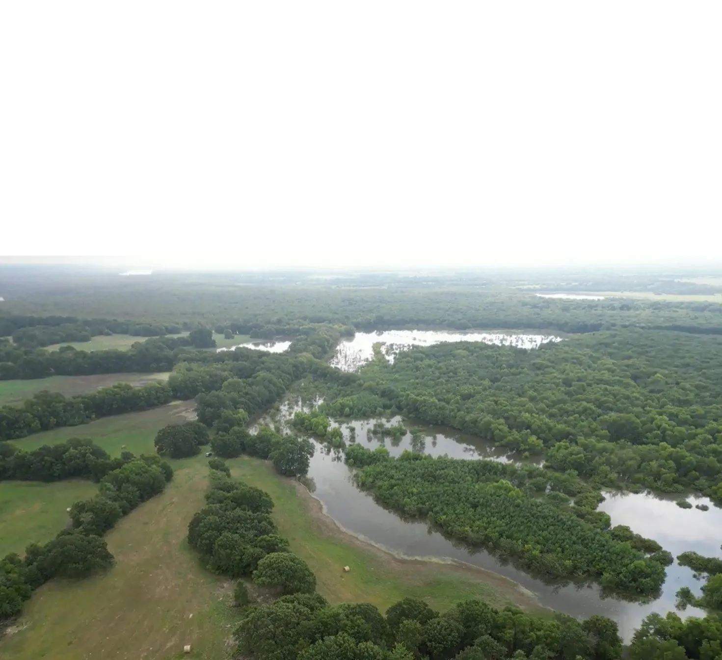 Aerial of lake frontage looking east