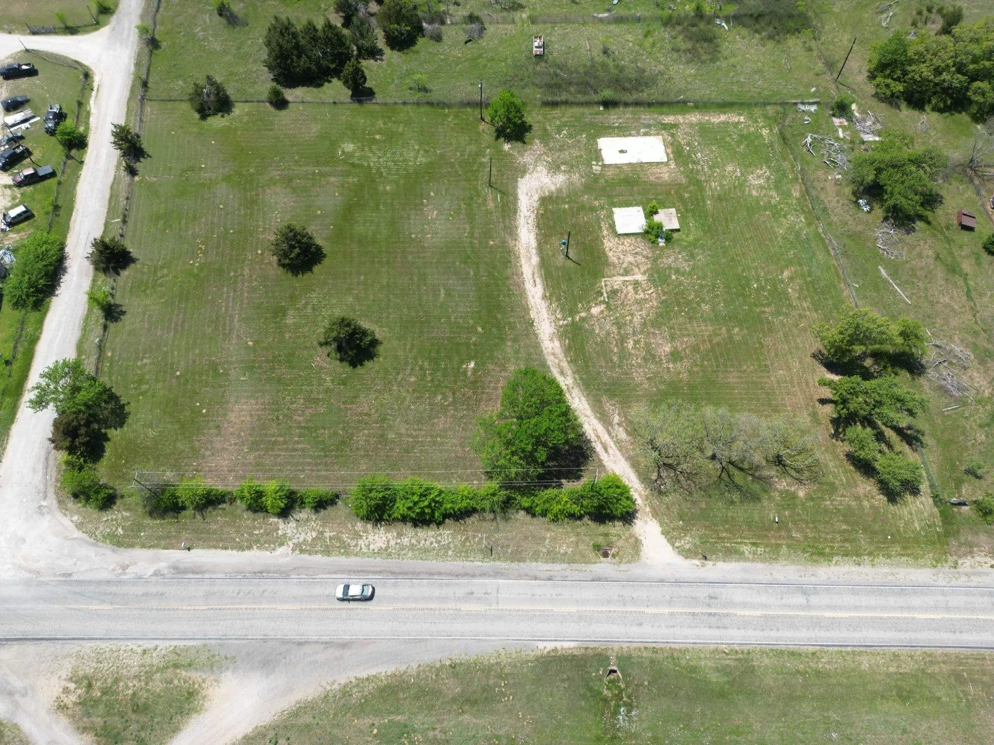 Aerial overview of property's location featuring rural landscape