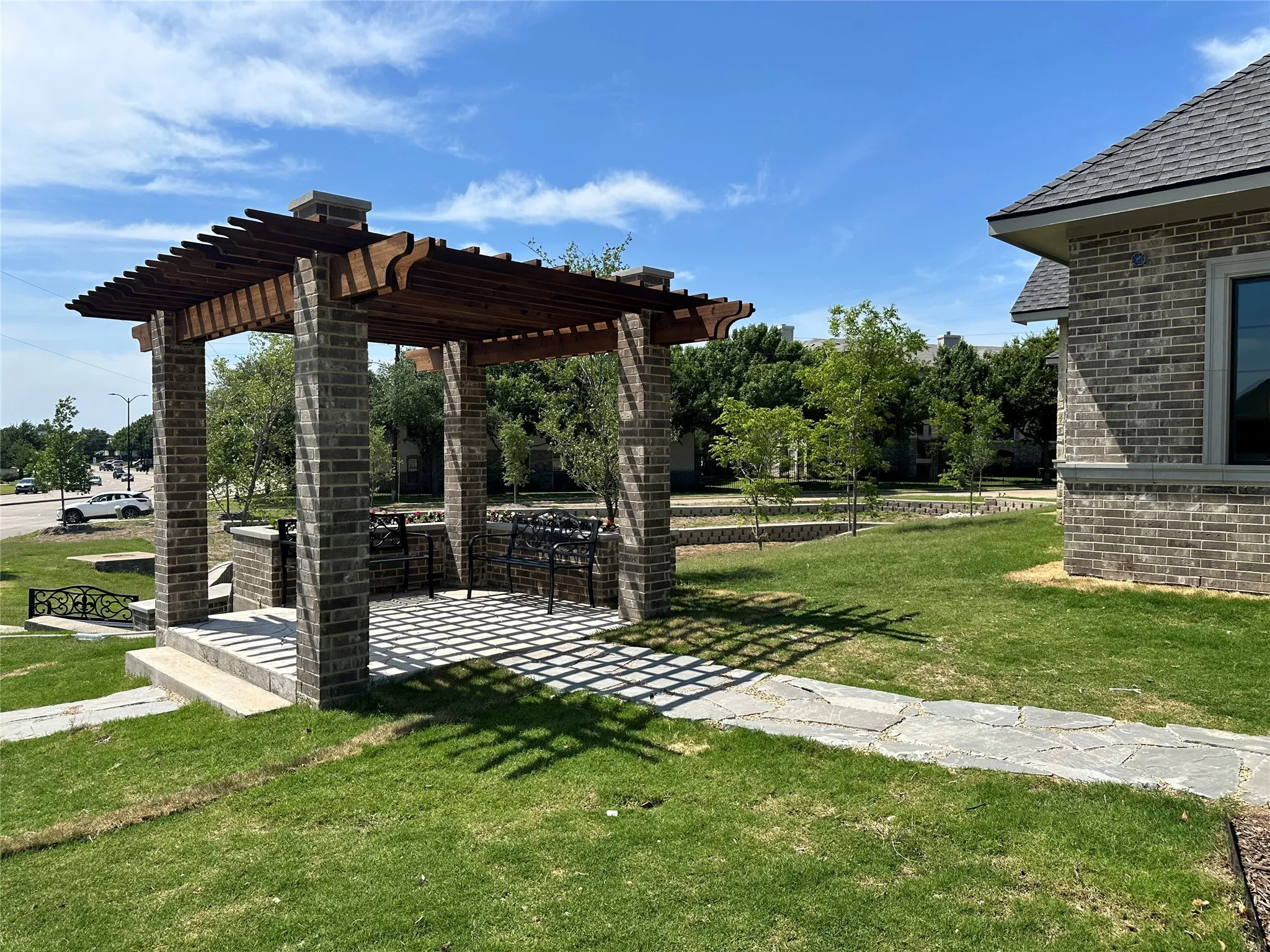 View of a pergola and patio area