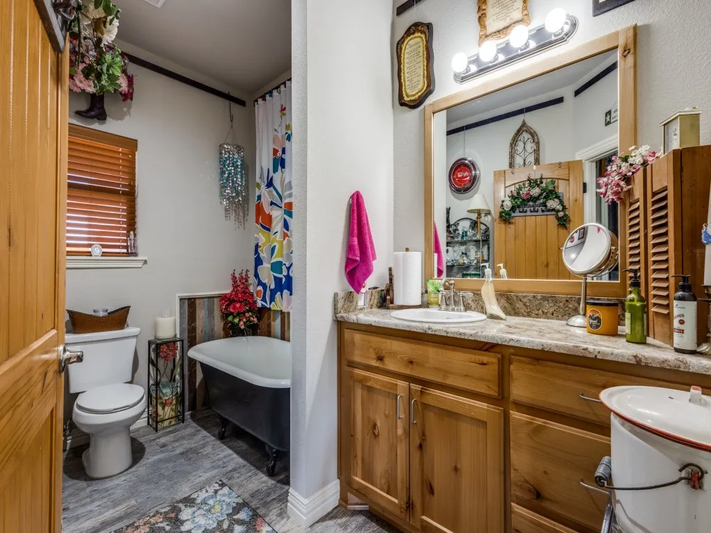 Bathroom with toilet and oversized vanity