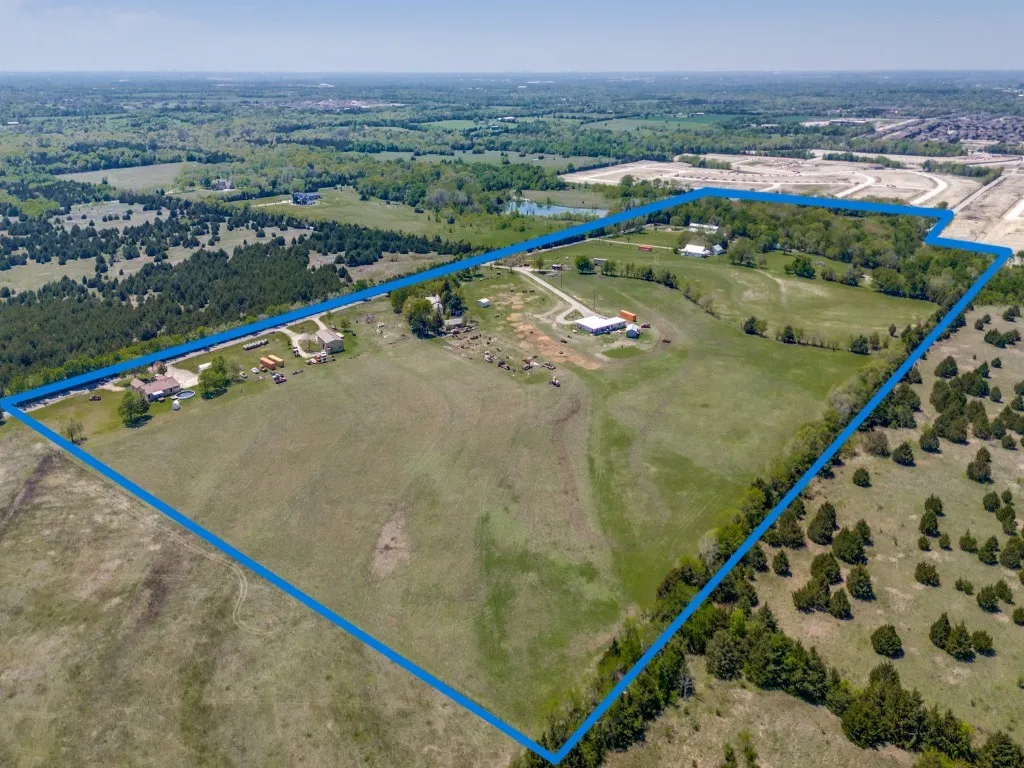 Aerial view from northwest corner - property outlines are approximate.