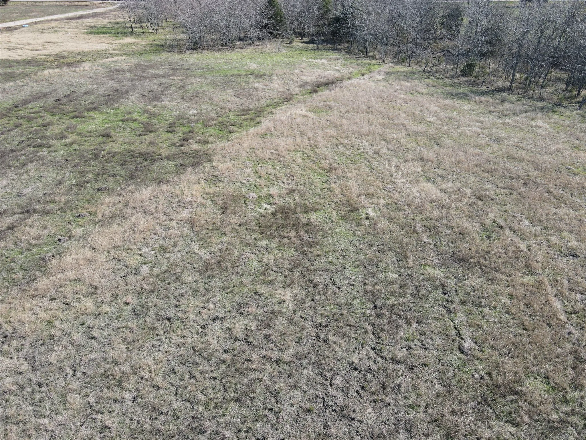 View of yard with a rural view