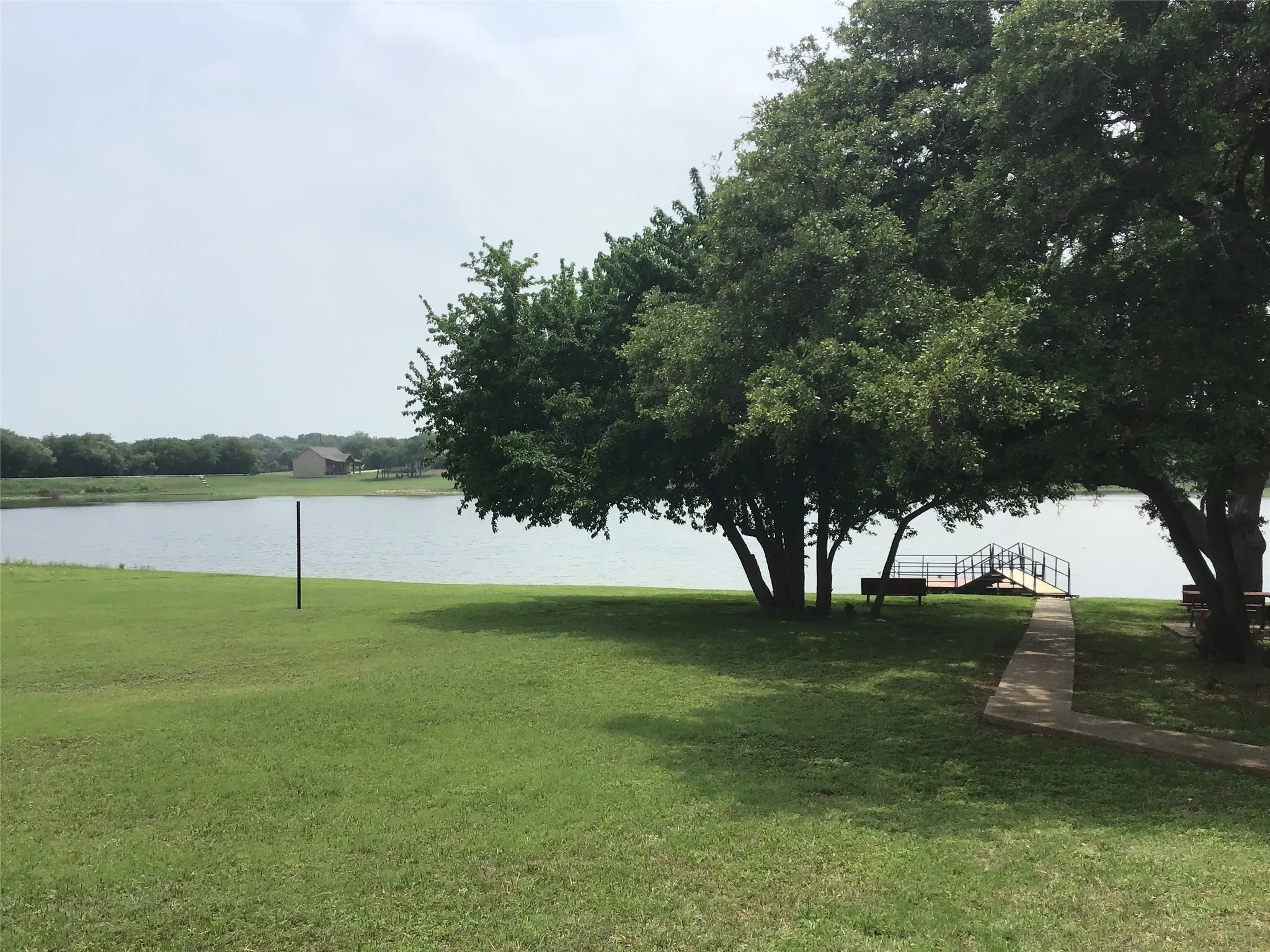 View of yard with a water view