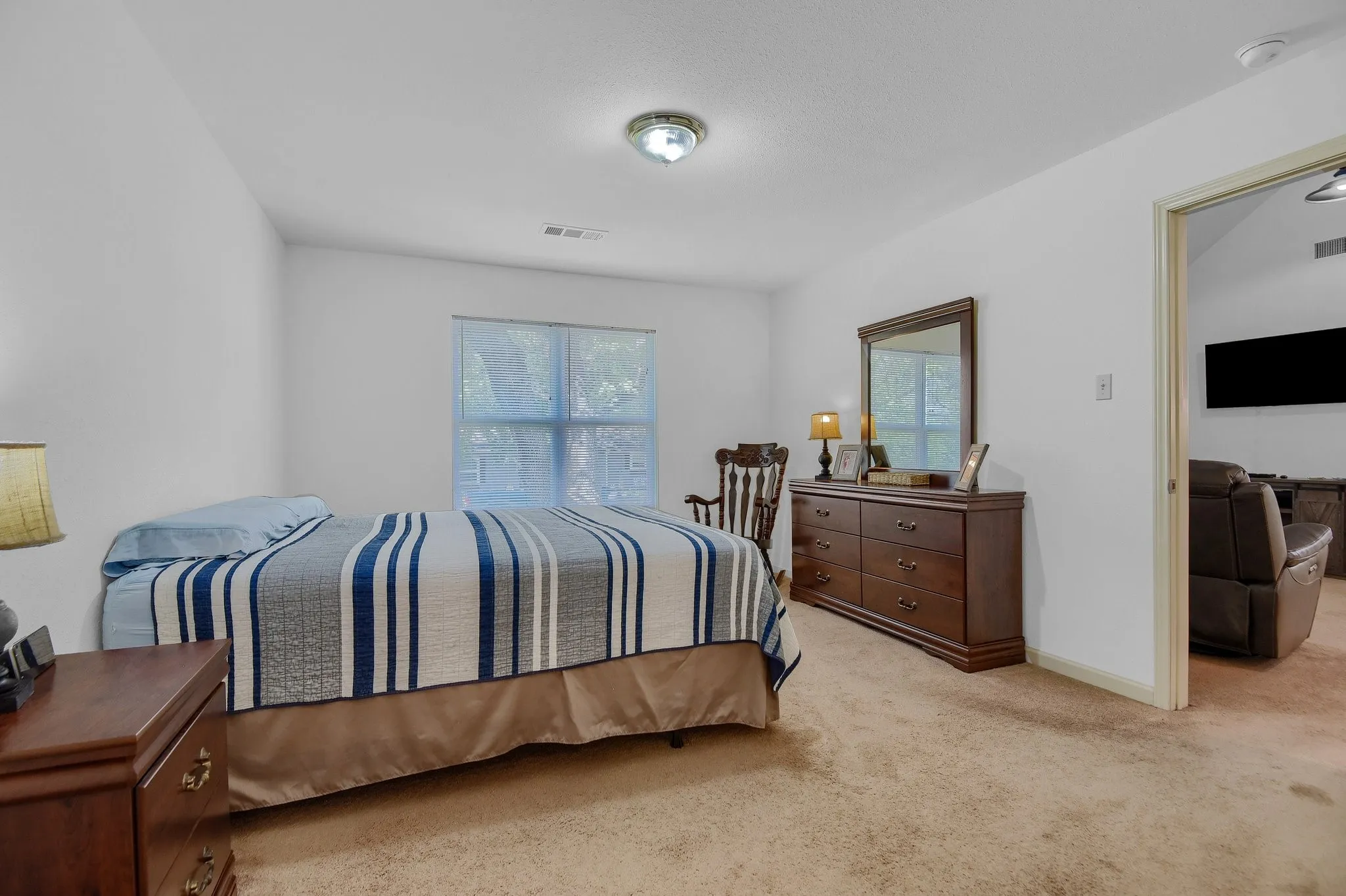 View of carpeted bedroom